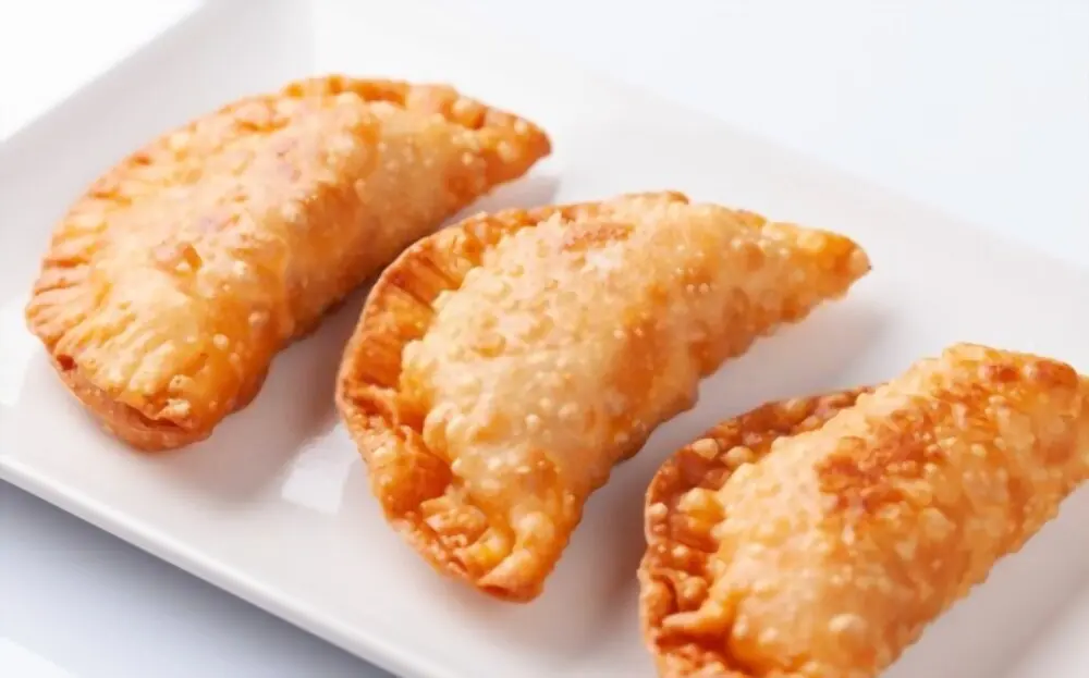 Empanadillas de atún con tomate fritas